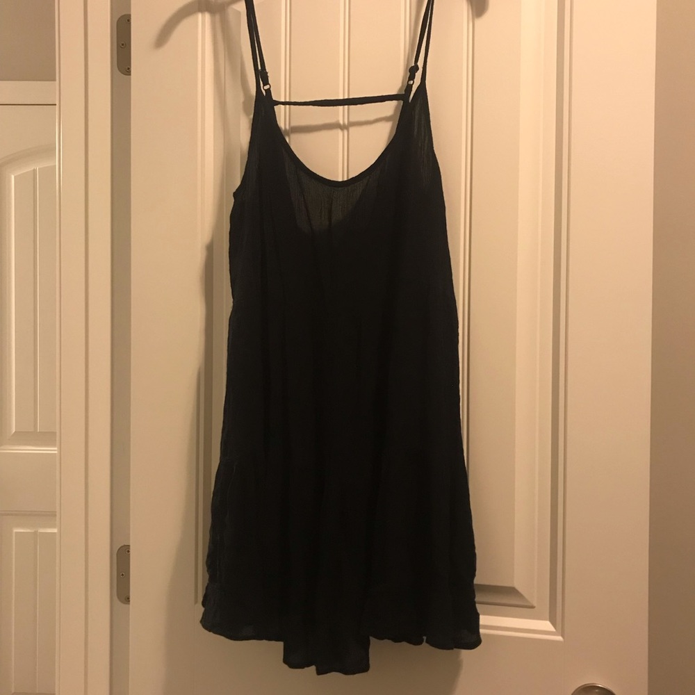 Flowy lace detailed open back little black dress